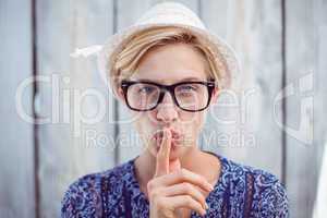 Pretty blonde woman wearing hipster glasses