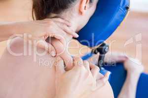 Woman having back massage