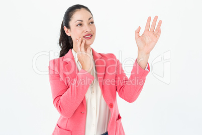 Elegant brunette showing with her hand Elegant brunette showing with her hand