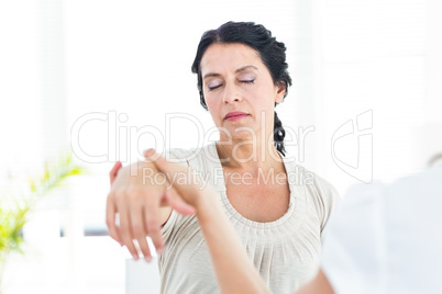 Hypnotized woman with her therapist