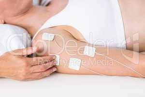 Woman having electrotherapy