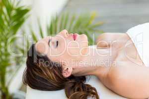 Calm woman lying on massage table
