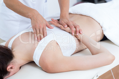 Physiotherapist doing back massage