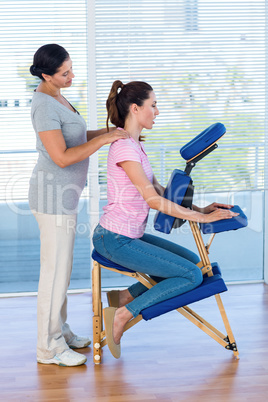 Woman having back massage