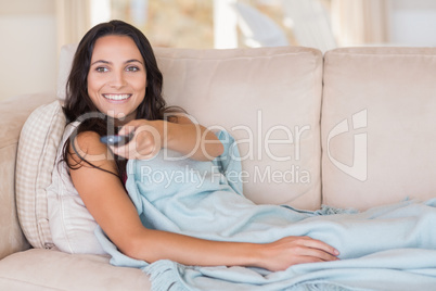 Pretty brunette relaxing on the couch