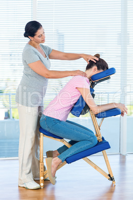 Woman having neck massage