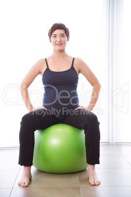 Pregnant woman keeping in shape