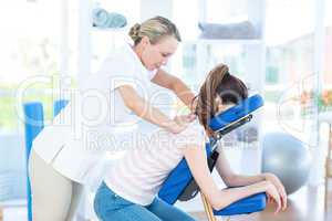 Woman having back massage