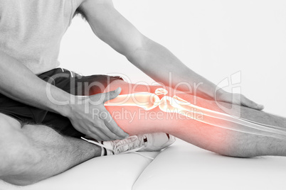 Highlighted knee of injured man