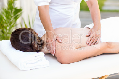 Brunette having back massage