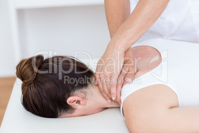 Physiotherapist doing shoulder massage