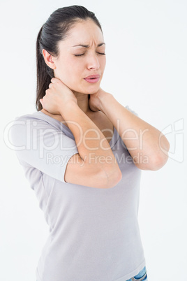 Brunette suffering from neck pain