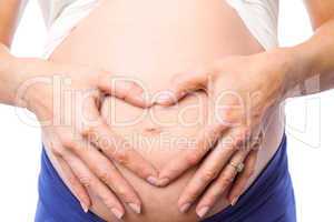 Pregnant woman holding her bump