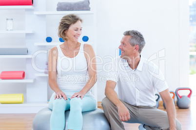Doctor and patient smiling at each other