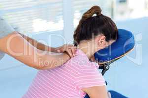 Woman having neck massage