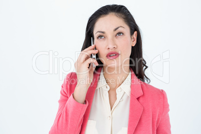 Elegant brunette calling on the phone