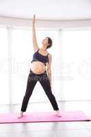 Pregnant woman keeping in shape