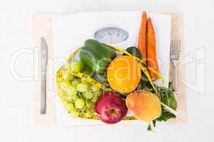 Weighing scales with fruits and vegetables