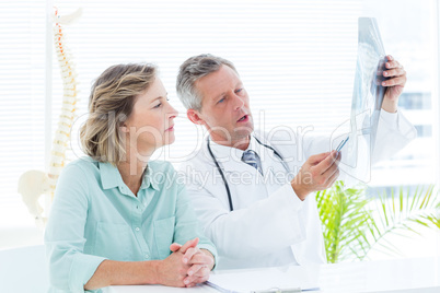 Doctor showing xray to his patient