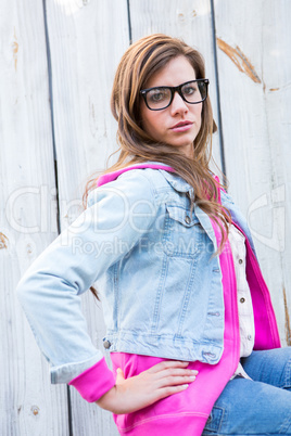 Brunette posing with hands on hips