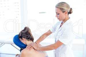 Woman having back massage