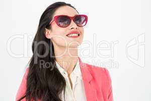 Smiling brunette wearing sun glasses