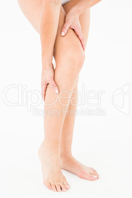 Natural woman with knee pain