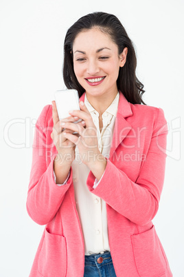 Elegant brunette texting with her mobile phone