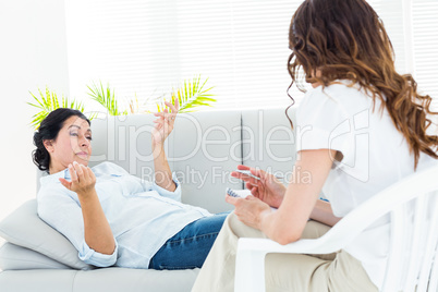 Depressed woman talking to her therapist