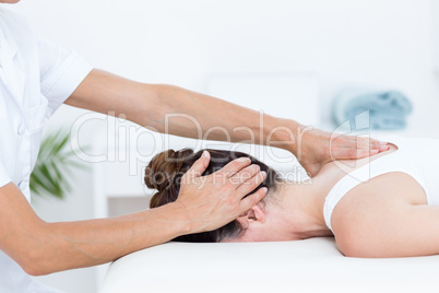 Physiotherapist doing neck massage