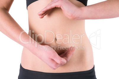 Woman with hands over belly