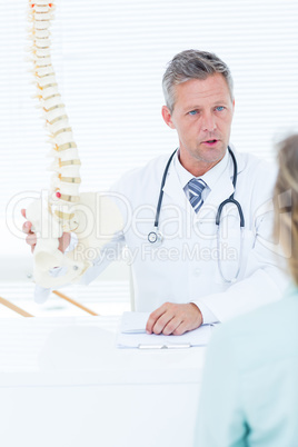 Doctor having conversation with his patient