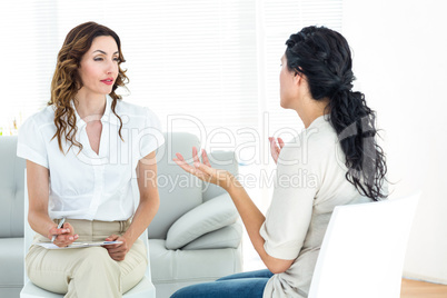 Depressed woman talking to her therapist