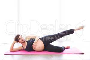 Pregnant woman keeping in shape