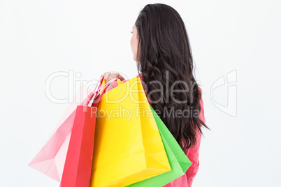 Brunette holding shopping bags