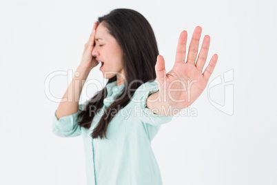 Irritated woman showing her hand