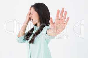 Irritated woman showing her hand