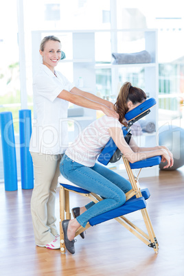 Woman having back massage