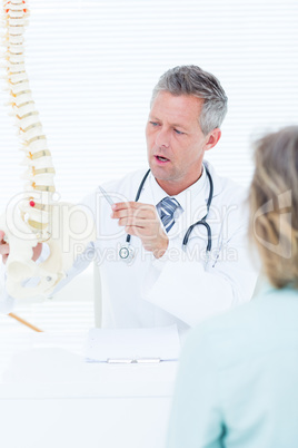 Doctor having conversation with his patient