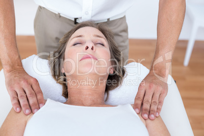 Woman receiving shoulder massage