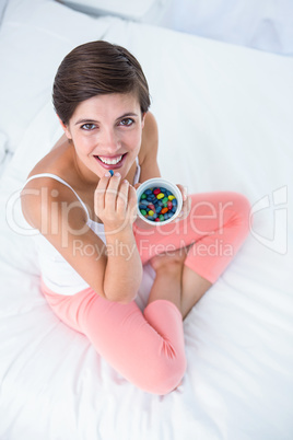 Beautiful woman eating sweet