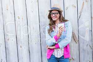 Cute woman holding disposable cup coffee