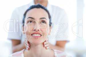 Woman having neck massage