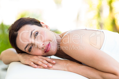 Calm woman lying on massage table