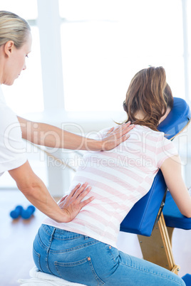 Woman having back massage