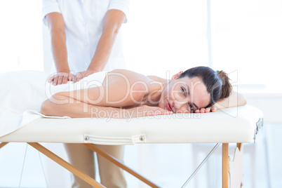 Woman having back massage