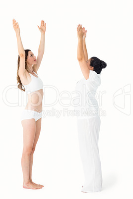 Relaxed women doing yoga