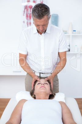 Woman receiving neck massage