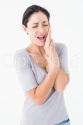 Woman suffering from teeth pain