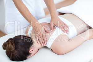 Physiotherapist doing shoulder massage